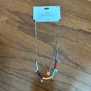 Ivory Ella 16 inch two-piece necklace set. With 3 inch extender chains goldtone